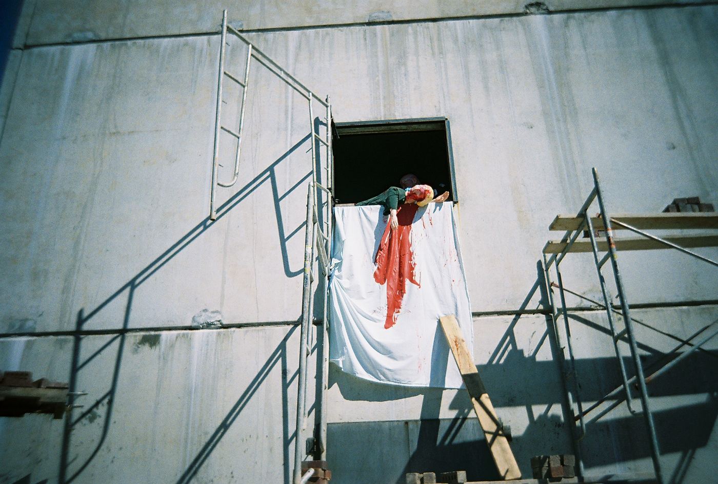 A scenario set in scaffolding against a concrete wall in Sumter, 2006