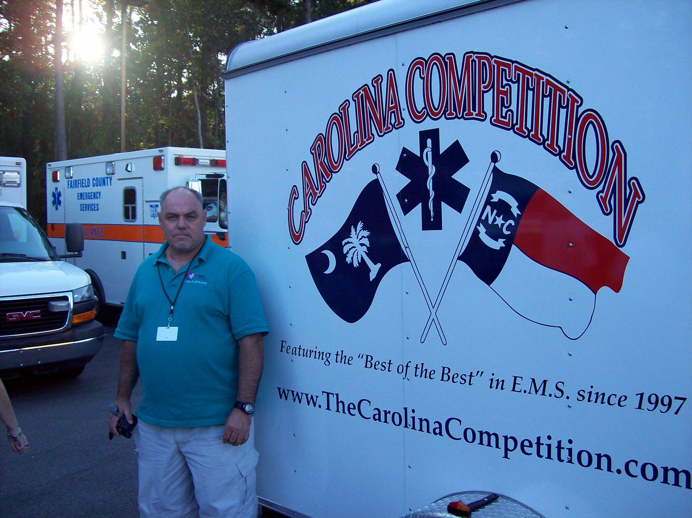 A man standing beside the Carolina Competition trailer in Florence, 2010
